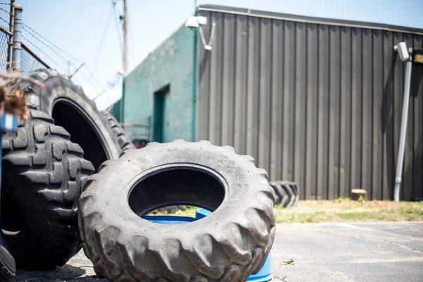 Large tractor tires (up to 600lbs) for strongman/Crossfit use in the parking lot