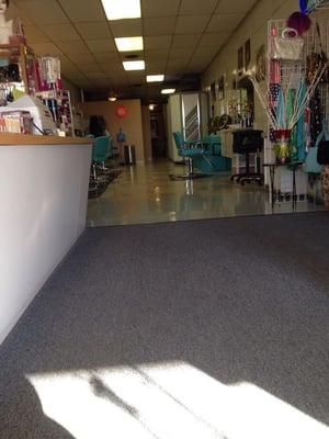 Inside of the tanning salon. Doubles as a hair salon.