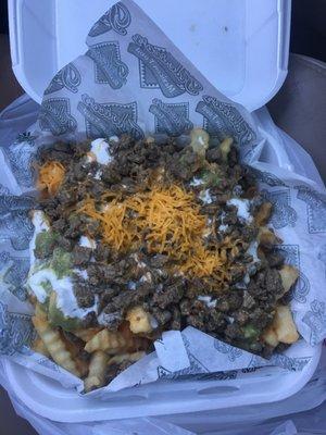 Carne Fries.... it was good I should have gotten the sauce to go with but if you need a carne fix it is good