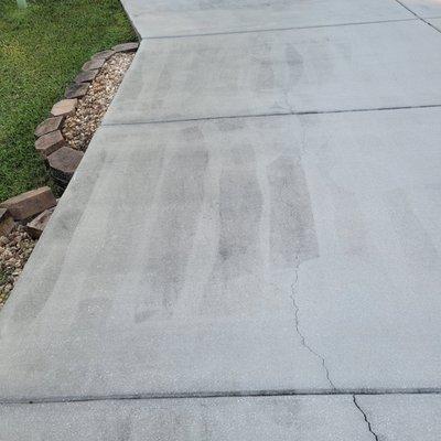 This is my driveway after it was pressure washed in the dark.