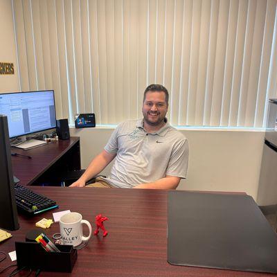 Aaron Kraft at his desk