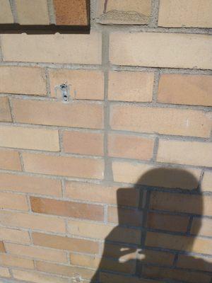 They did the repair correctly but they left the crumbling brick above.