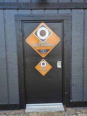 Entrance. Parking behind building.