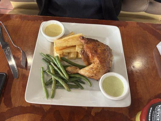 1/4 chicken with 2 sides (green beans and yuca). Plus two sauces (unknown) but really good. One was spicy and one was mild.