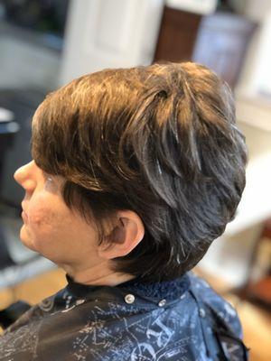 Client has very thick hair , she's a chef & must wear a hat while working. This cut is an easy care shampoo and go.