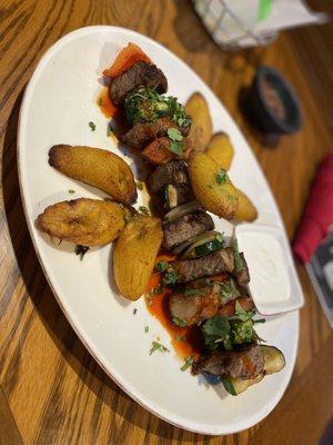 NY steak kabob/ sub plantains for rice and beans