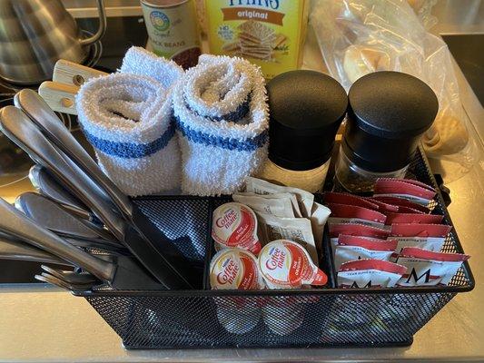 Utensils, salt, pepper, sugar, creamer, olive oil.. complimentary