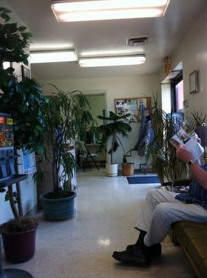 Lobby area. Two couches. Vending machine and coffee too.