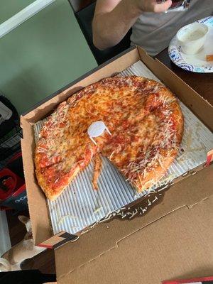 Large cheese pizza with parmesan flavored crust.