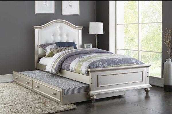 Twin Bedframe with trundle bed
9378