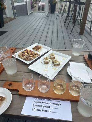 White Wine flight and beer cheese flatbread and whipped ricotta