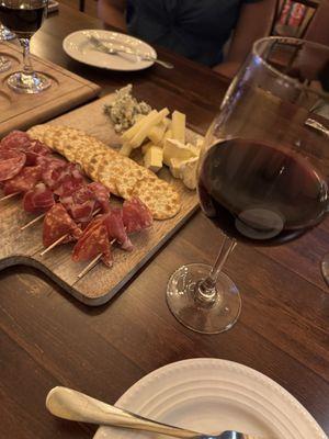 Charcuterie + glass of wine