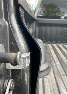 Sticks out more than an inch from the side of the bed