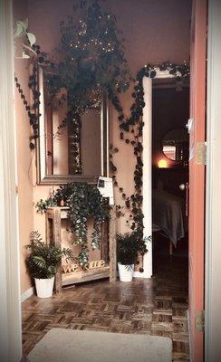 davis massage center -- inviting entry way, adorned with climbing plants