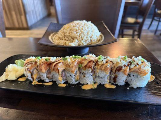 King crab crunch roll with a side of rice.