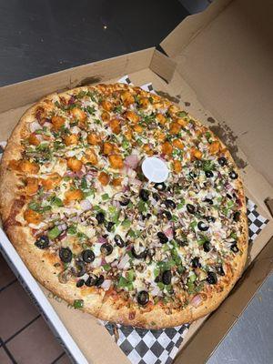 I order a large pizza half chicken and veggie ,