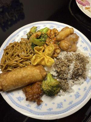 Mayon chicken, shrimp egg roll, white rice, cream cheese wontons, general so, chicken lo mein, and chicken w/ broccoli.