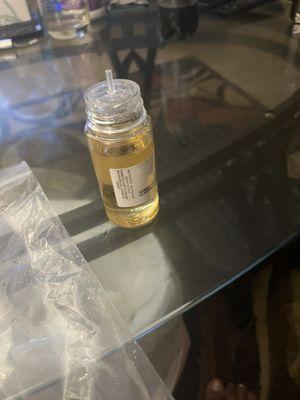 the bottle and the top flew off and fluid was lost.