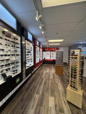 Premium sunglasses and inexpensive sunglasses share floor space with Ray-Ban sunglasses at Select Shades Sunglass Outlet in Lake George, NY.