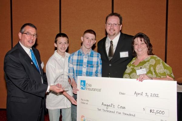 Erie Insurance Donates $2,500 on behalf of Bean Insurance Agency to the Angel's Cove Adoption Center...