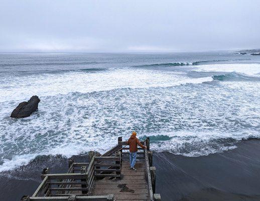 Black sands, 3 story wooden stair descent, terrifying waves at high tide