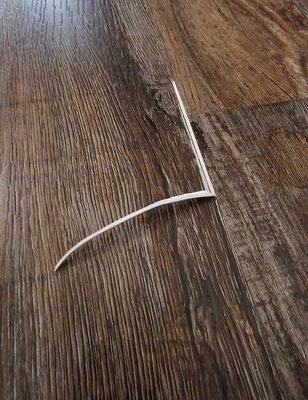 My flooring is cupping and peeling throughout the whole house.