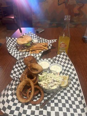 Fish and onion rings, coleslaw, Bleu cheese burger and fries. Hard Pineapple Jarritos