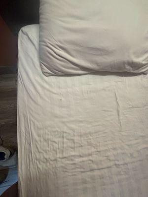 There are holes in the bed from cigarettes.