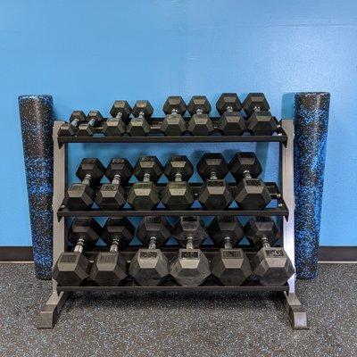 Dumbbells for our clients to get strong and gain muscle. Foam rollers to release tension and knots in the body.