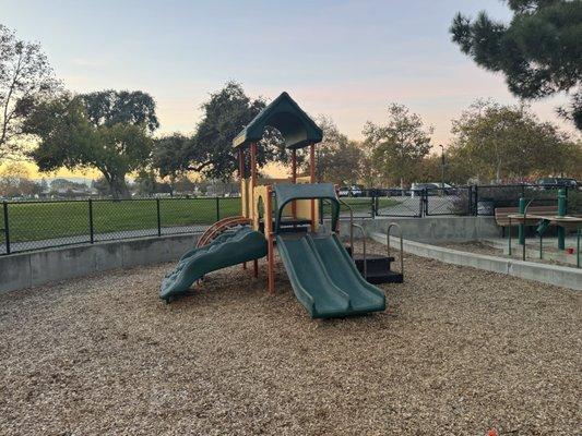Playground for your 2-5 yr olds on woodchips