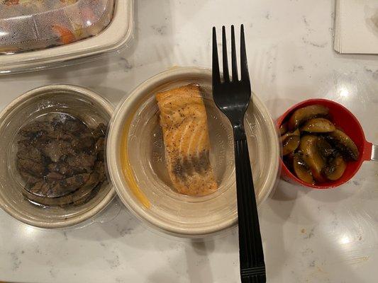 Sides of steak, salmon and mushrooms