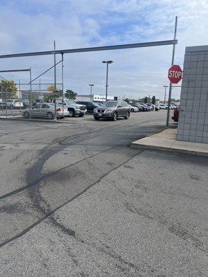 Oil spill from first external sighting at back of building where my vehicle exited the work bays.