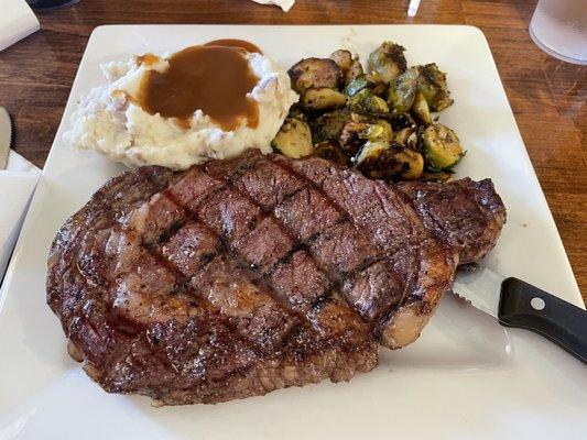 Grilled 16oz local Ribeye w/ fresh mashed potato (w/ skins!) and veggies (grilled Brussels sprouts!) totally worth the $29.