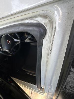 Left scratches and door molding off.