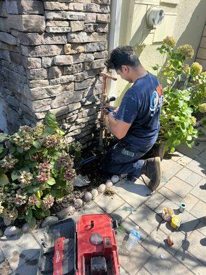 New residential service riser with new shutoff, regulator and spigot