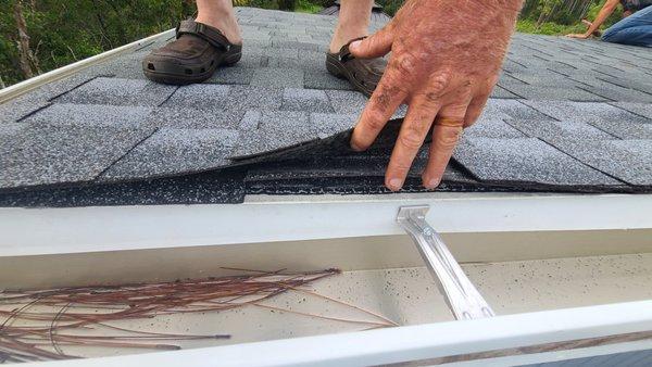 Standing water under shingles