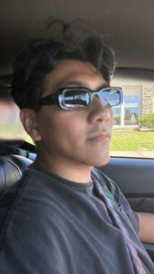 Not the frames we got but he looks good here in my sunglasses on the way home.