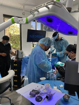 Full mouth extractions and implant placements in preparation for implant supported dentures under general anesthesia