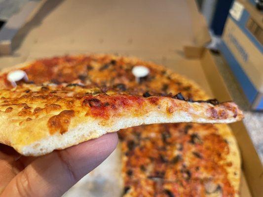 Side profile of two topping pizza