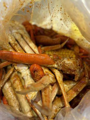 Snow crab bag with live crawfish added