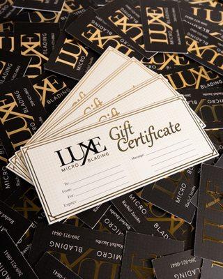 Raised gold foil embellished gift certificates.