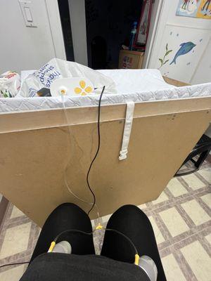 The dirty kids bathroom with no door I had to pump in