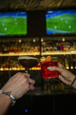 Unwind at the bar while watching your favorite team.