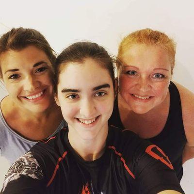 April is in the Middle and I am on the right (Red Hair, black shirt)