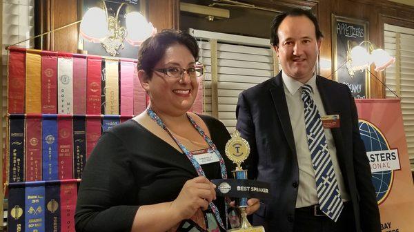 An Amazing guest public speaking friend gets a speaking award.