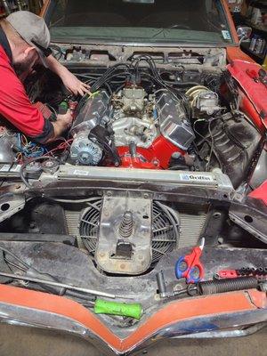 Installing an engine. We know engines inside & out.