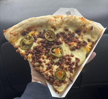 Chorizo, egg, jalapeño breakfast pizza.