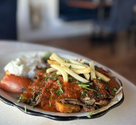 İskender Kebab: Lamb & Beef Gyro w/ butter toasted pita, homemade marinara sauce, greek yogurt | $23.95