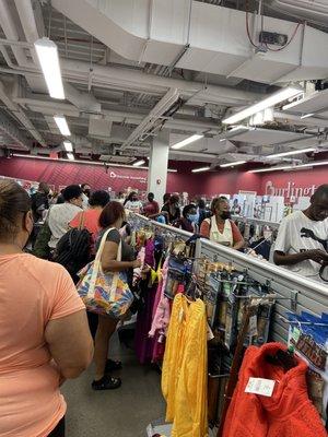 Packed line of 60+ shoppers and only two open registers