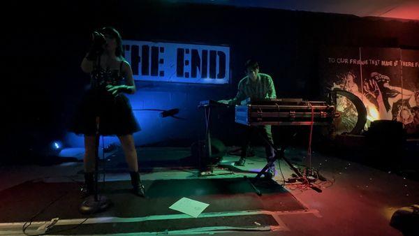 The band Glass Spells performing on the stage